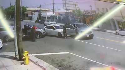 ICE hit &amp;amp; swarm a vehicle in LA immediately deploying tear gas and holding the occupants at gunpoint. The 2 men are US citizens per wife of one man