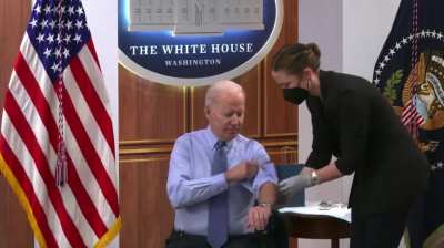 NOW - Biden says "I'm not sure why I'm doing it on stage" and gets his second booster injection.