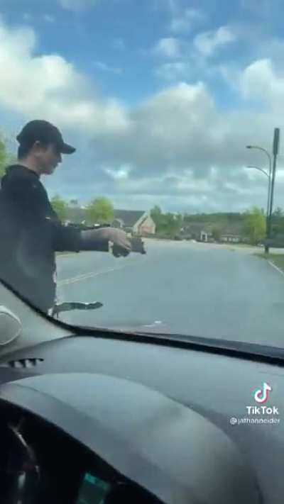 Getting a turtle off the road on the way to a Halloween party
