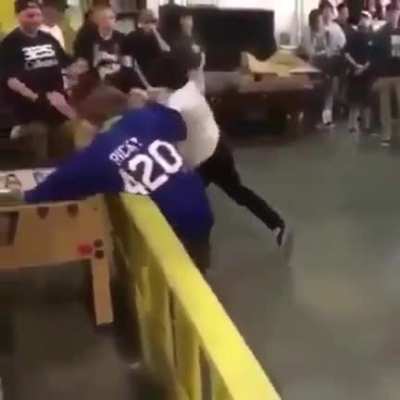 Moron in a mosh pit (?) assaults people