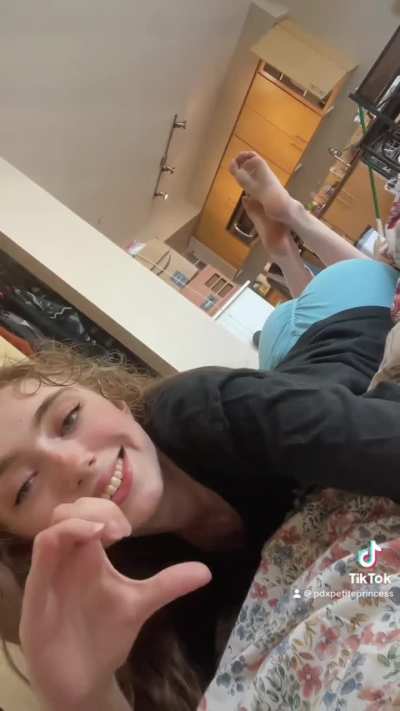 Petite college girl showing u her soles after the gym