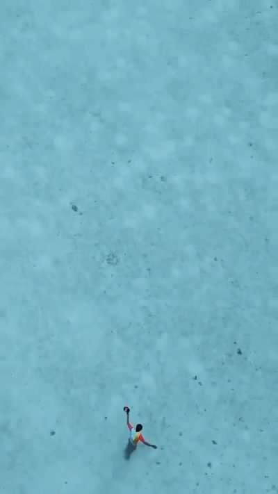 Crystal clear waters of Lakshadweep Islands beach.