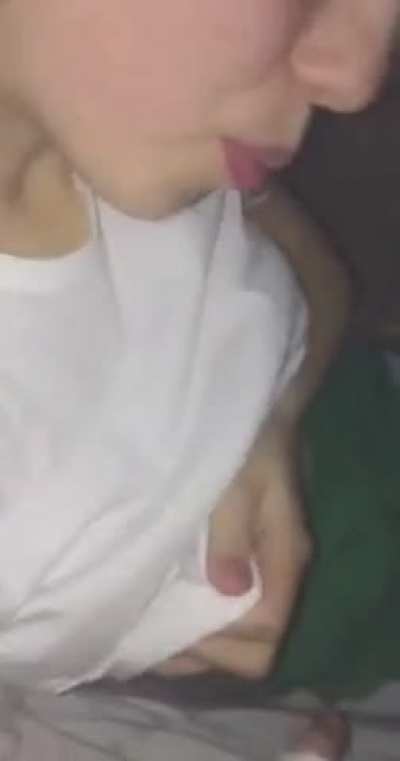 She spits it on her perfect nipples