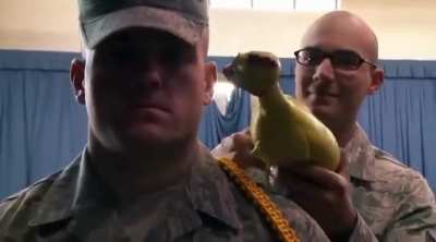 Newcomers in the United States Air Force undergo the 'Rubber Chicken Bearing Test' to challenge their composure (2012)