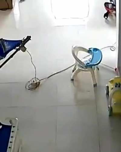 A mother&rsquo;s and a baby&rsquo;s nap disturbed by a large snake