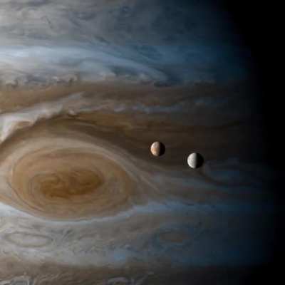 Timelapse of Europa and Io orbiting Jupiter captured by the Cassini probe