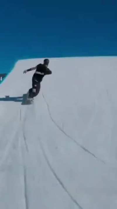 I don't know how they filmed this but the snowboarder is perfectly captured