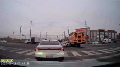 Redlight runner hits a school bus. Not good...