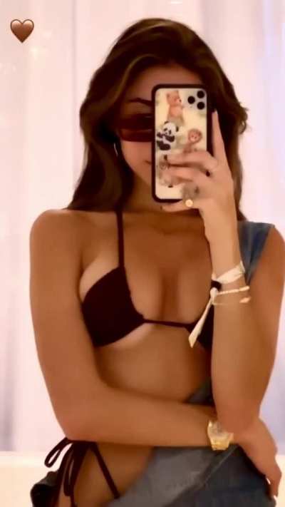 Showing off her insanely sexy tits