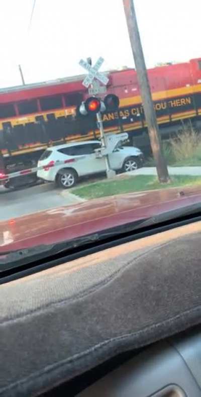 Everyone is ok. Witnessed this morning. Lady decides to stop in the middle of some tracks.