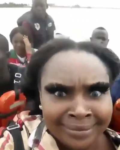 Long eyelashes on a windy boat ride