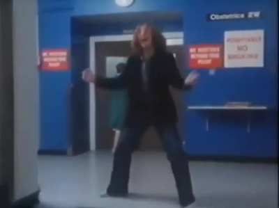 John Lennon kicking a trash can and happily screaming "YEAH!", while a nurse runs away from him.