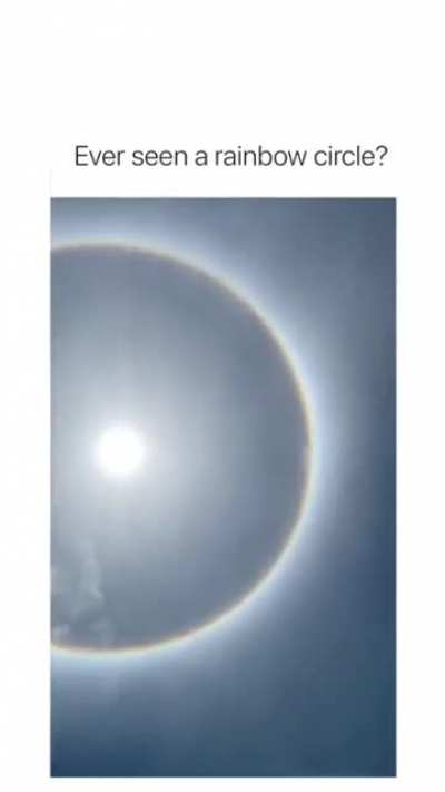 A Rainbow Circle viewed from the beach