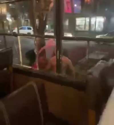 Angry man smashes restaurant window and cuts his arm.