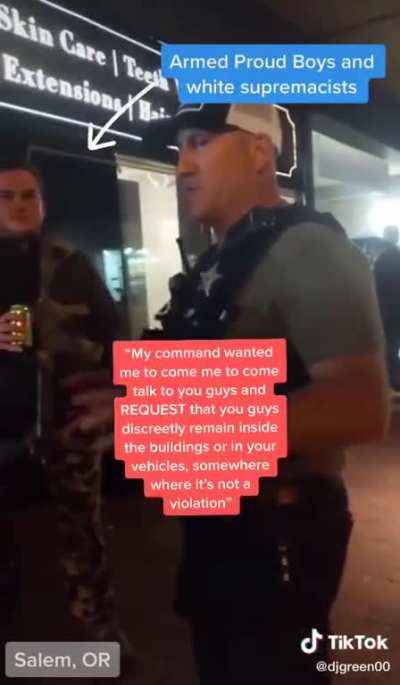 POLICE OFFICER TELLS PROUD BOYS TO HIDE INSIDE BUILDING BECAUSE THEY'RE ABOUT TO TEAR GAS PROTESTERS. THE OFFICER SAID HE WAS WARNING THEM "DISCREETLY" BECAUSE HE DIDN'T WANT PROTESTERS TO SEE POLICE "PLAY FAVORITES."