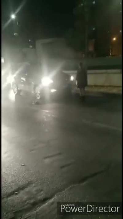 Idiot stands in front of cars and pisses off drivers, gets what he deserved
