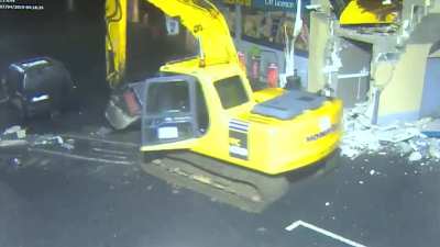 Guy litteraly just steals ATM.