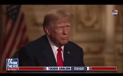 Look at douche bag Tucker staring at the blob he hates with a passion, and he won't even correct his stupidity, or senility.