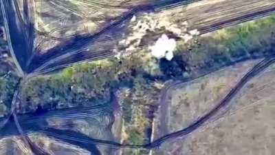 Ukrainian drone footage showing the destruction of a Russian 2S9 "Nona-S" self-propelled 120-mm mortar using a M30A1 rocket. Several vehicles close to the target were also damaged. Geolocation: 47.3385, 36.0471 Aftermath picture in comment.