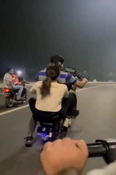 Riding a motorcycle without a helmet
