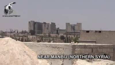 Coalition air strike on ISIS position in Manbij, Syria. During YPG/SDF offensive on the town in 2016.