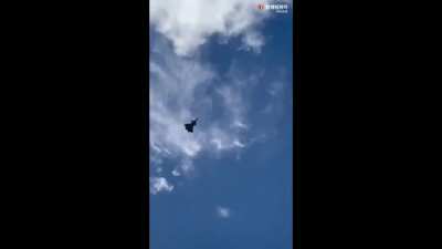 J-20 fly by in Qidong