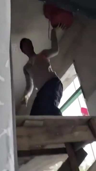 Removing wasp nest