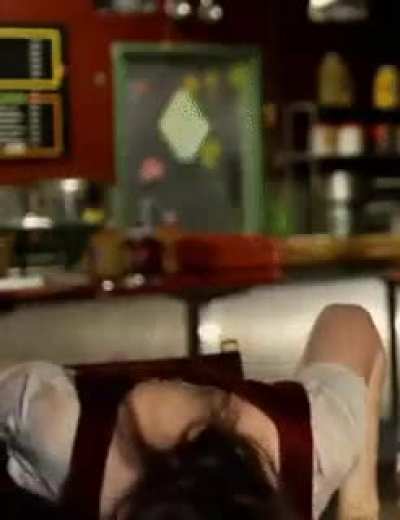 Flings her hair