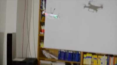 Replacing a lightbulb with a drone