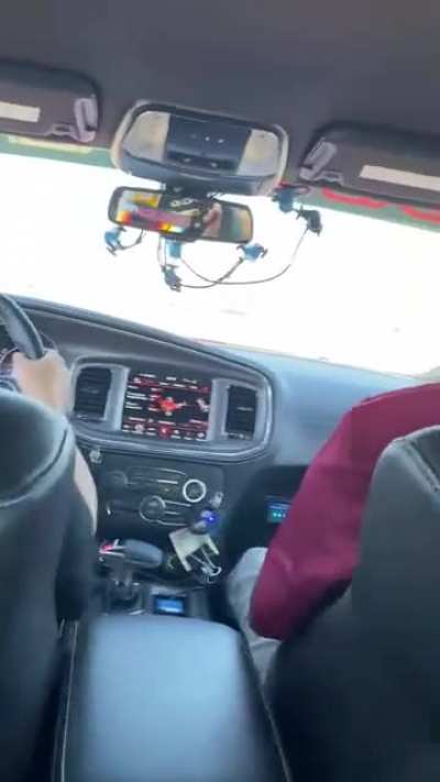 Watch this video of my mom having a great time at the race track doing a drifting ride along