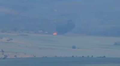 Reportedly a Russian helicopter being shot down by Ukrainian forces in the Donbass, June 2022.
