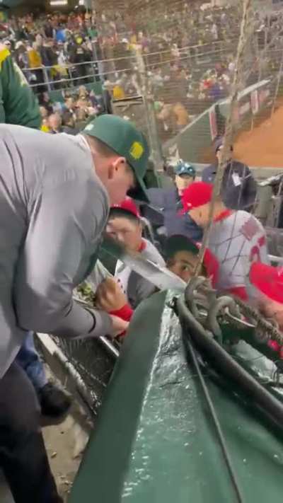 Professional baseball player confronts fan for cursing at him.