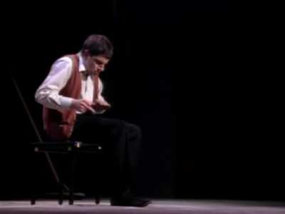 Rowan Atkinson rocks on, playing an invisible drum set in a 1992 television special.