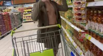 beautiful skinny shows her boobs in a mall