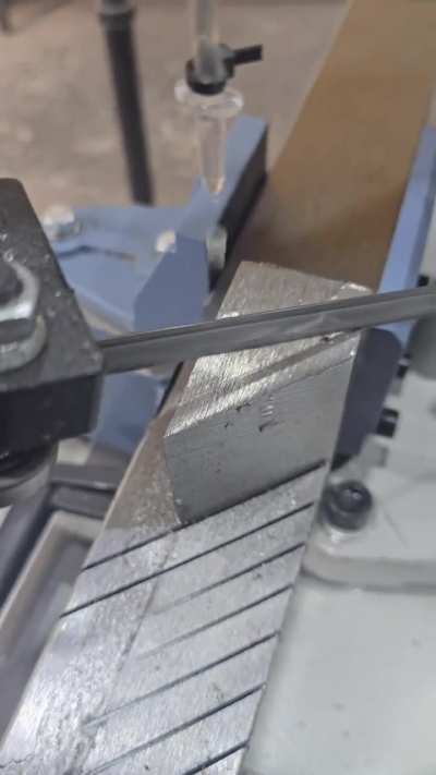 Cutting at a 45-degree angle to assemble the mosaic.