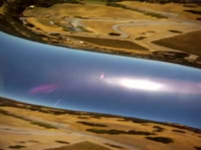 Camera falls from a plane into a pig pen