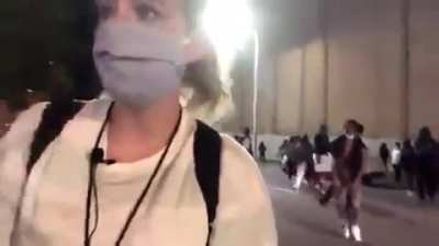 Angry rioters attack some white men