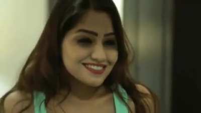 Simran kaur posing in a tank top.