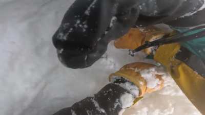 Situationally aware skier saves the life of snowboarder stuck upside down in the snow (NSFW: language)
