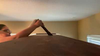 Vacuuming the top of my entertainment center!