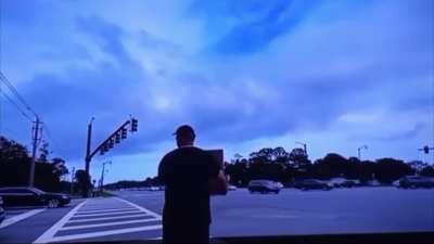 &ldquo;Concerned citizens&rdquo; keep calling the cops on a man holding a sign that says &ldquo;Eat a Bag of D**ks&rdquo;