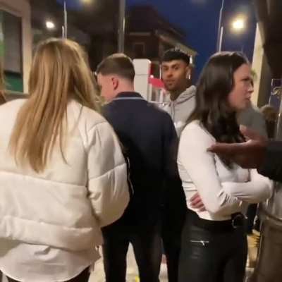 Girl racially abuses doorman because her friend wanted to stay in the bar and she didn't