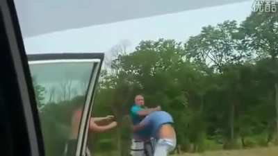 Guy driving like an idiot,tailgates a man who is driving with his wife and child. The idiot then passes and brake checks the family and corners them in with no escape leaving the dad no option but to protect his family. Idiot driver gets a lesson in "dad 