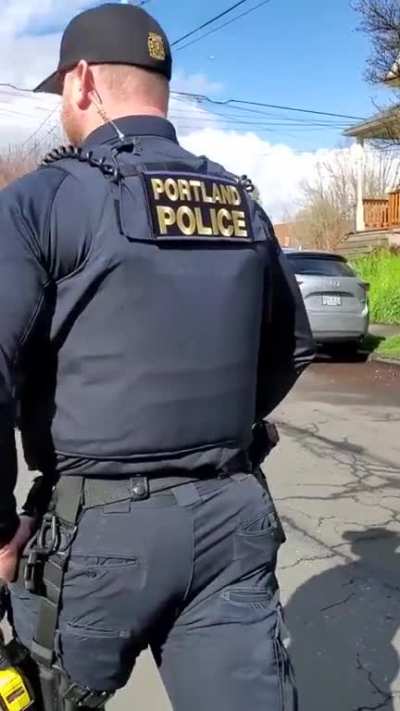 Lady yells "you're going down douchebag" at a police officer until he walks away