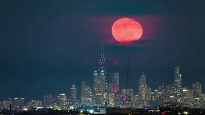 Full moon rising behind the Hancock [OC]