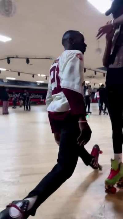 Roller skating up to a couple ladies