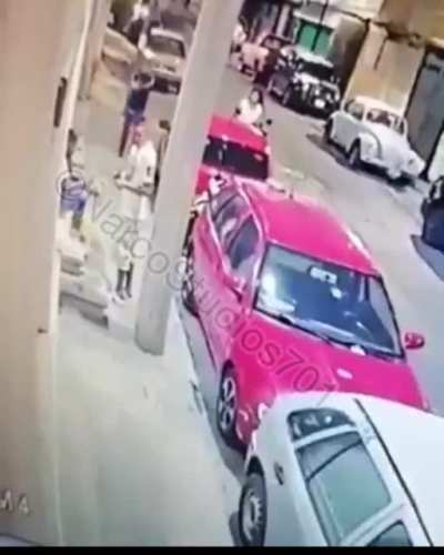 This is crazy hitman in mexico going after a target.. the victim did survive but a very horrific scene