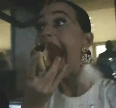 Trying to swallow hot dog