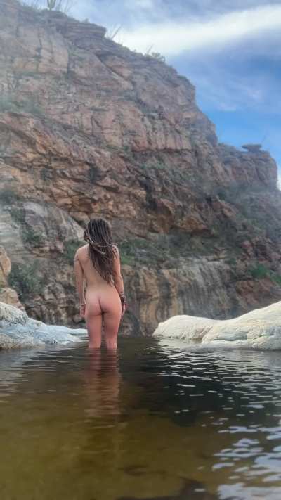 Skinny dipping over an 80 fr waterfall