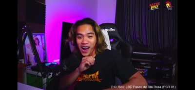 long-haired raemon using his reverse card.